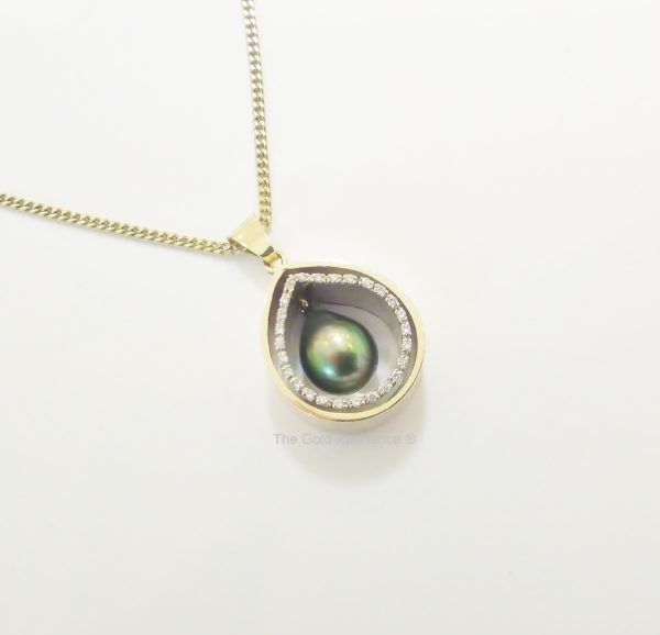 Necklace pendant Tahitian pearl white gold yellow gold diamonds