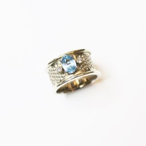 White gold band ring with topaz and diamonds