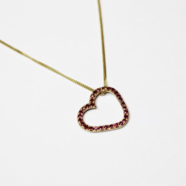 Gold heart with rubies