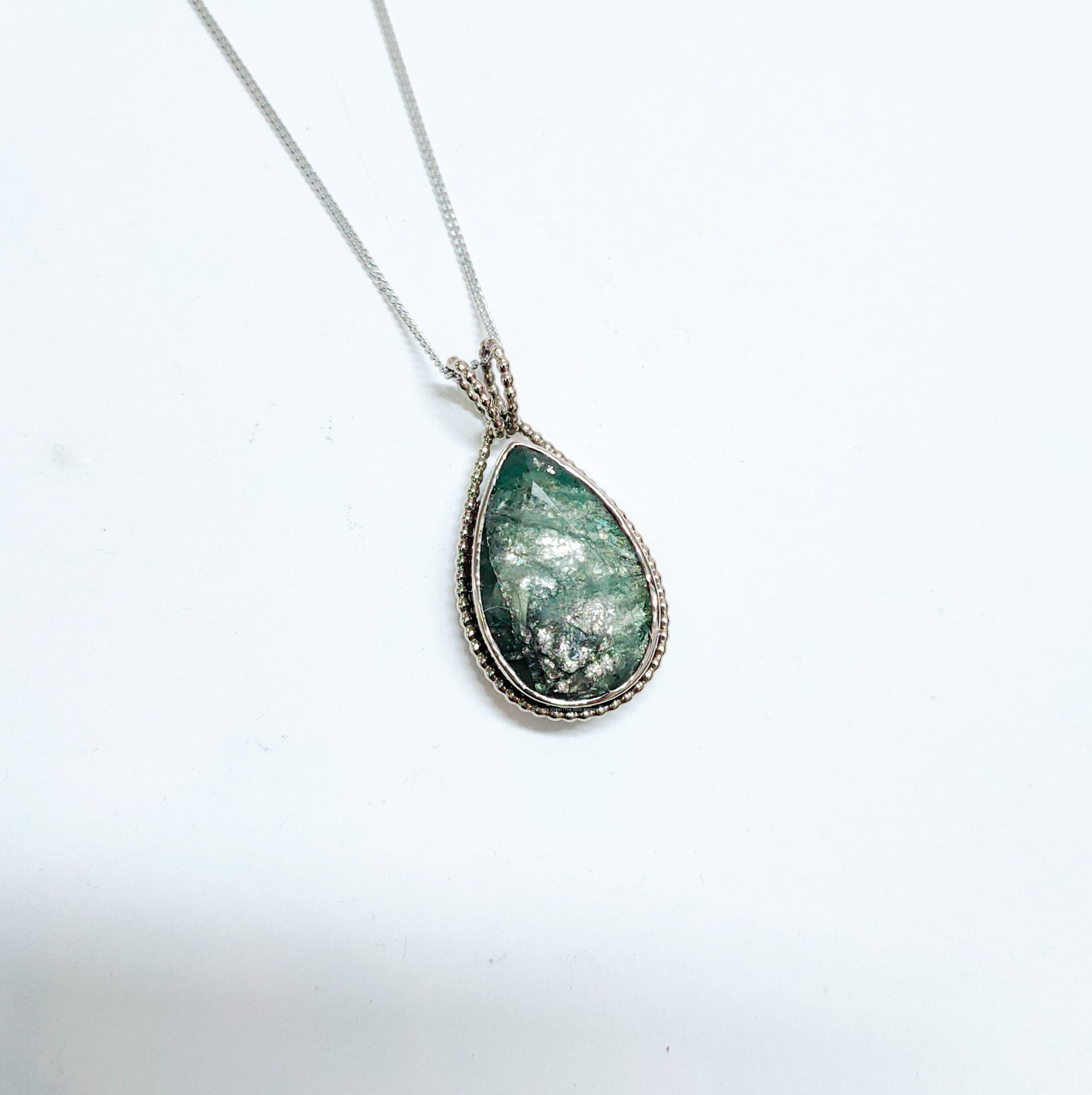 white gold green emerald zambia pendant